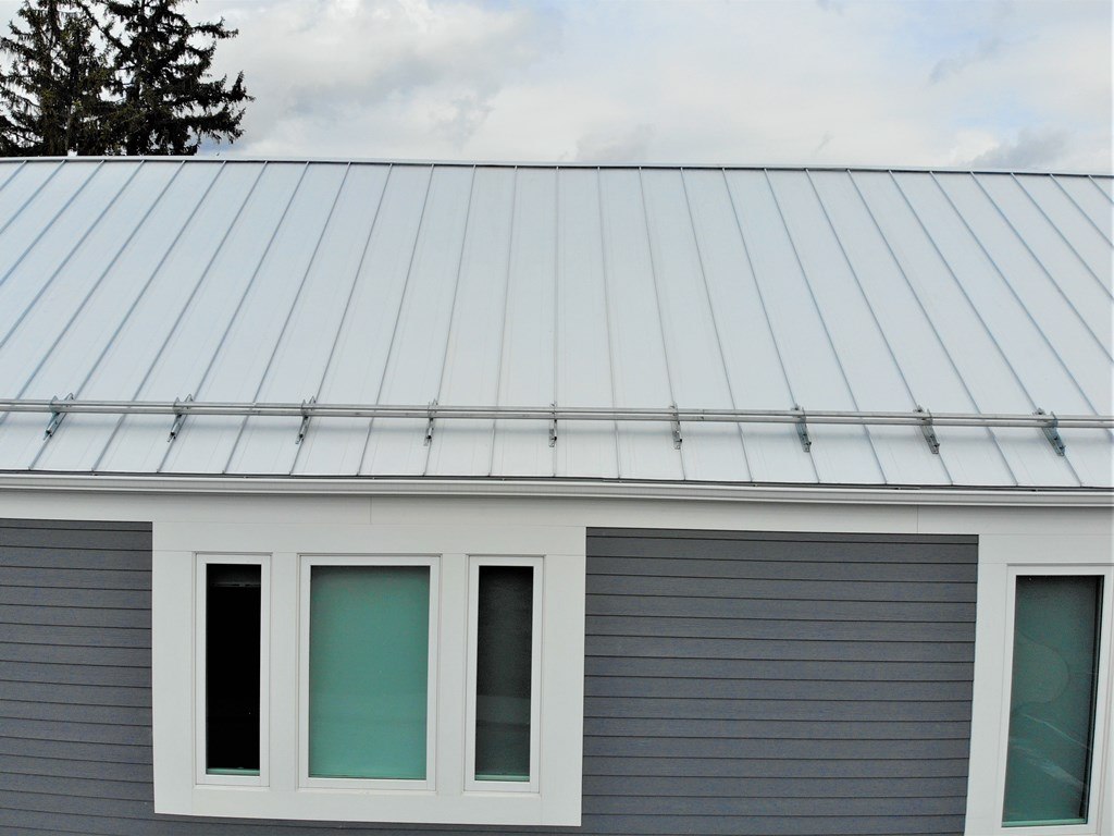 Snowguards for standing seam