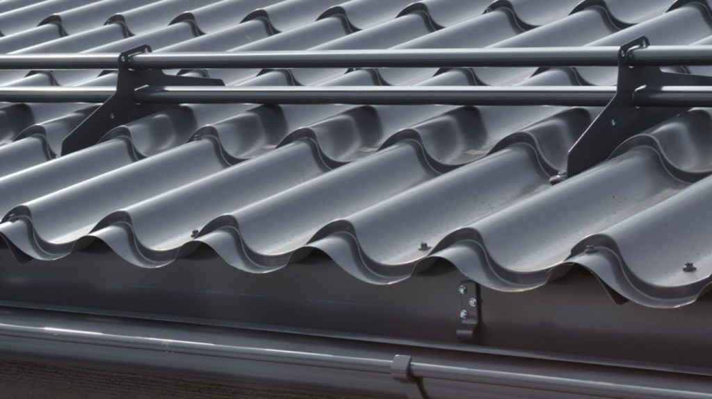 Metal tile roof snow guards