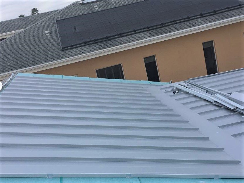 Aluminum standing seam roof installation