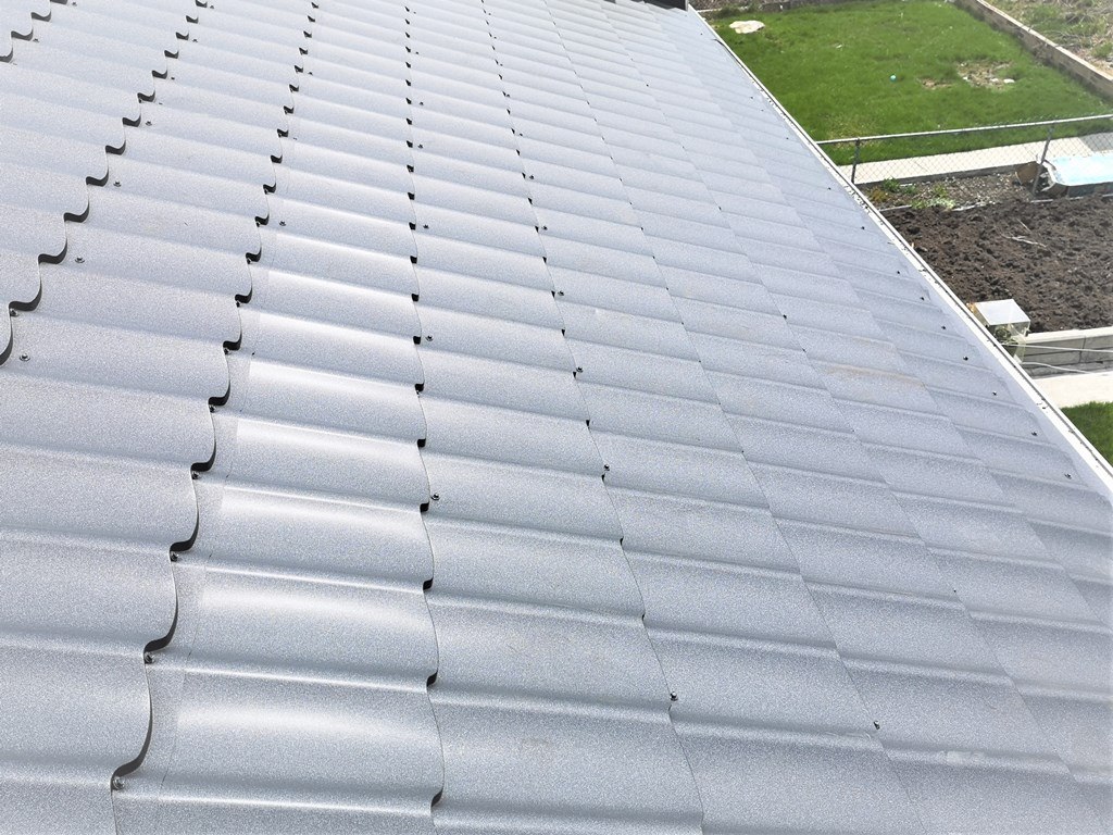 Metal tile panels on the roof