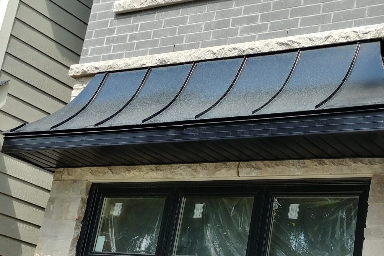 Bay window curved standing seam roof