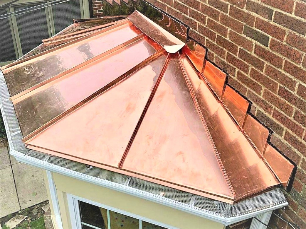 Copper bay window standing seam roof