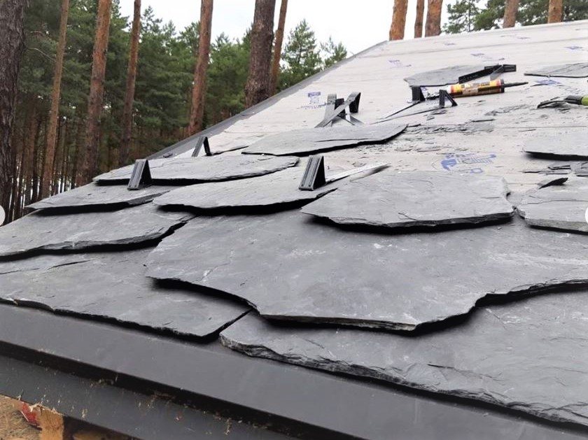 Snow guards installation on slate roof