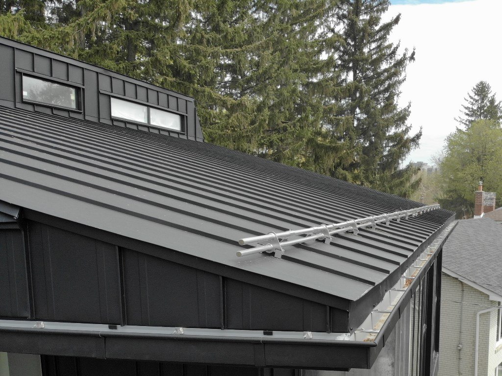 Standing seam metal roof snow guards