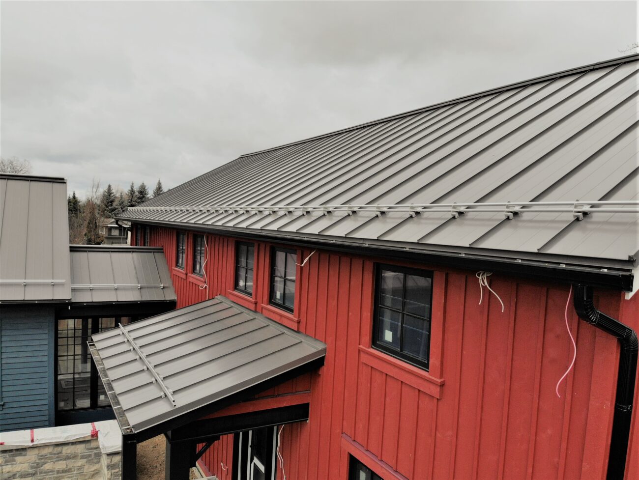 Standing seam metal roof with ORIMA snow guards installed on a new residential property in Mississauga, Ontario