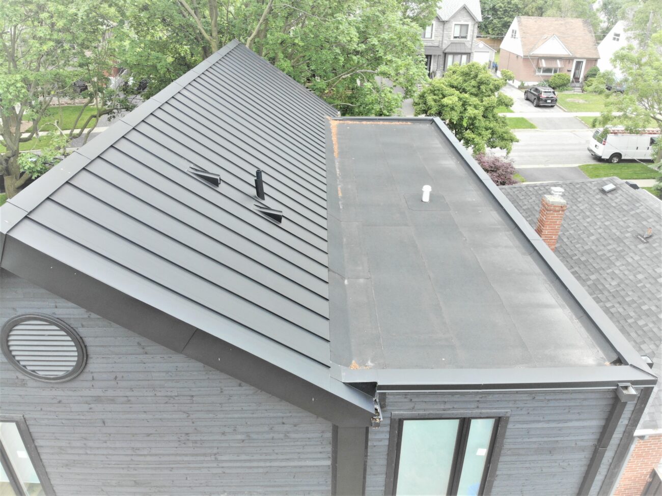 Torch-down bitumen flat roof section on residential property, Etobicoke Toronto