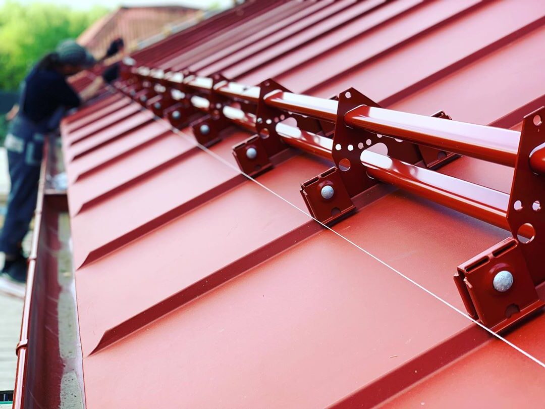 snow guard installation process on standing seam metal roof