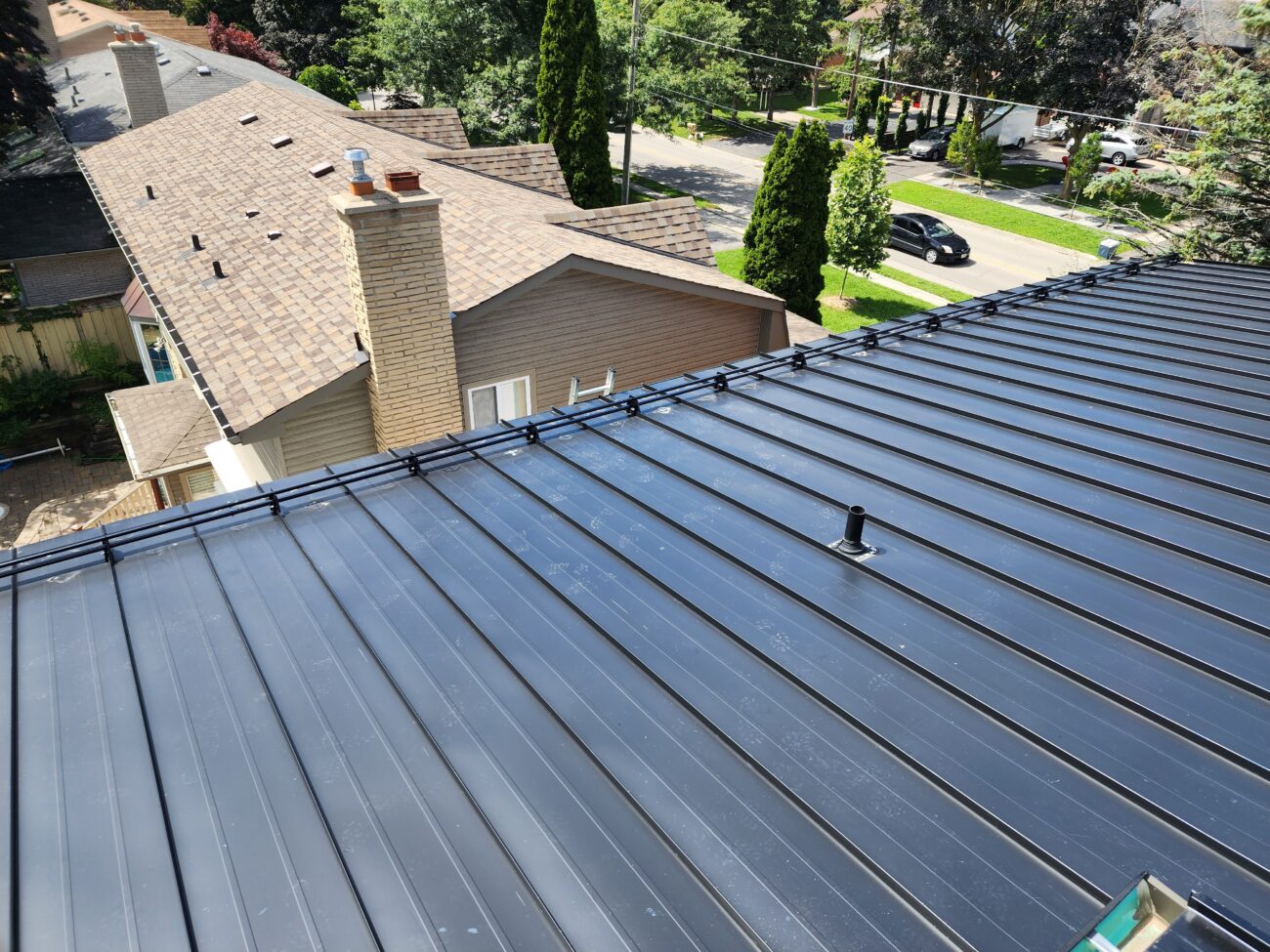 Standing seam metal roof on residential property in Aurora, Ontario