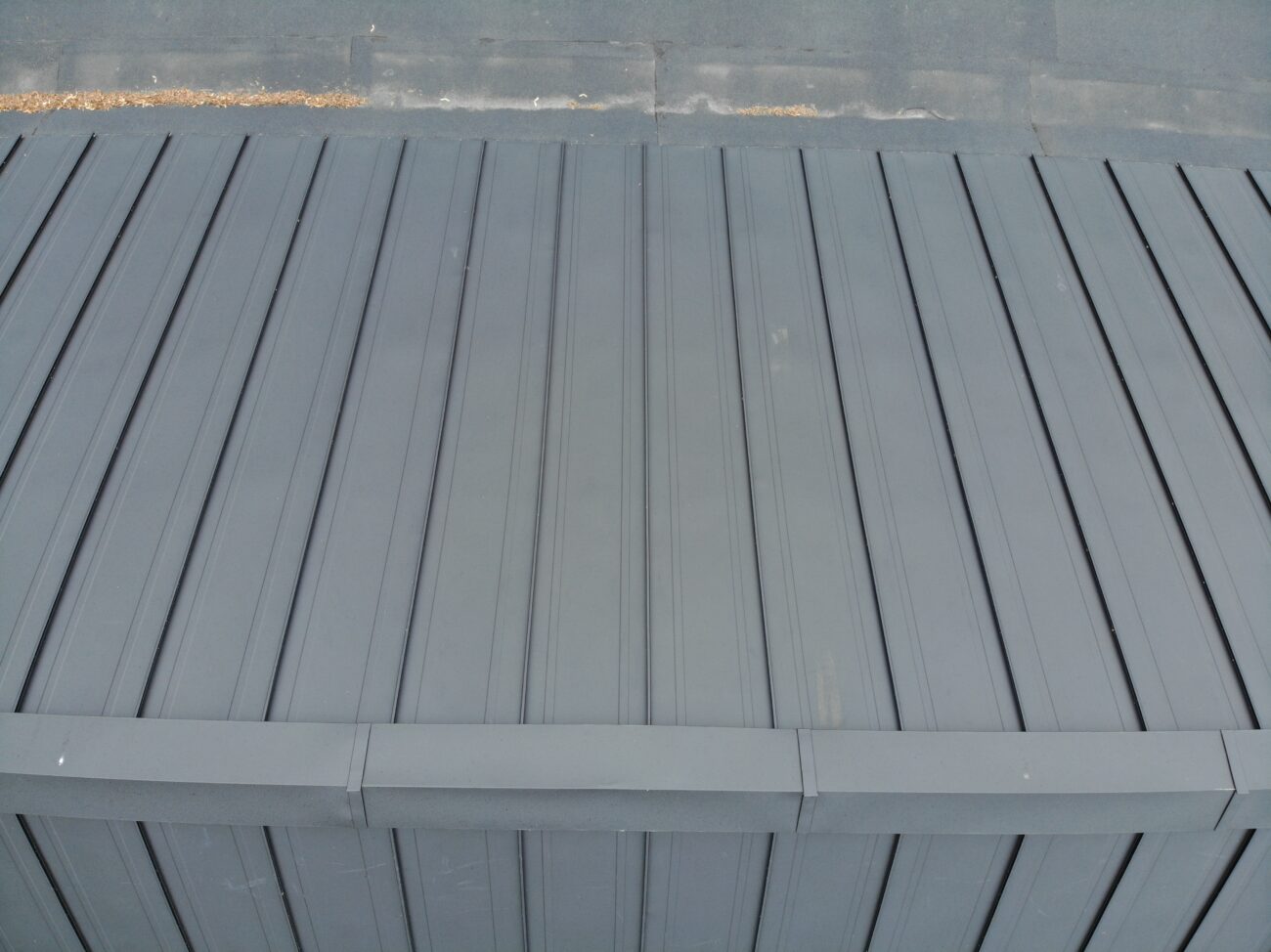 Standing seam metal roof and wall cladding on residential property in Etobicoke, Toronto