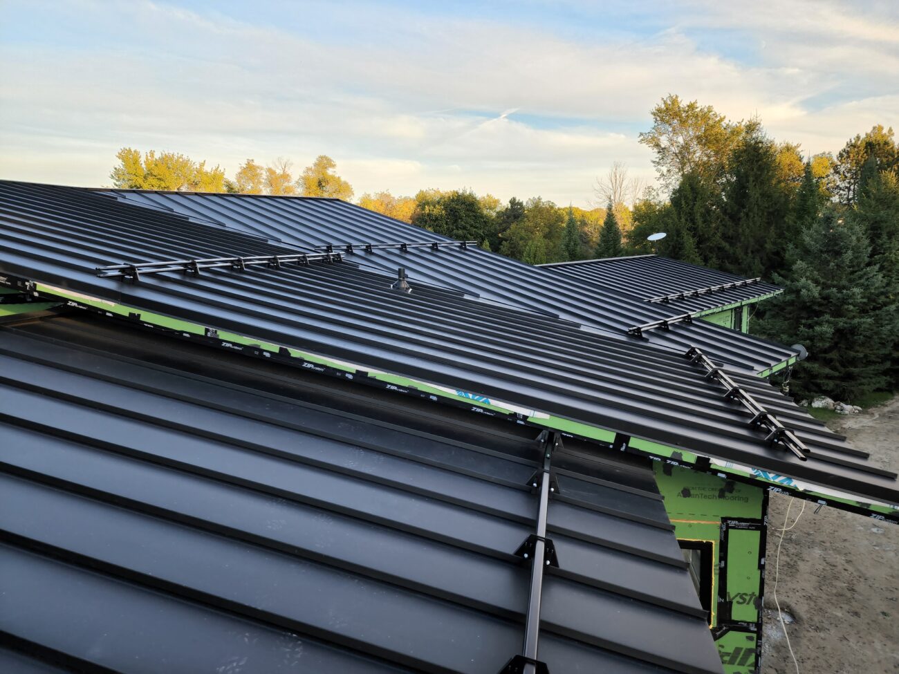 Standing seam metal roof installation process, Barrie Ontario