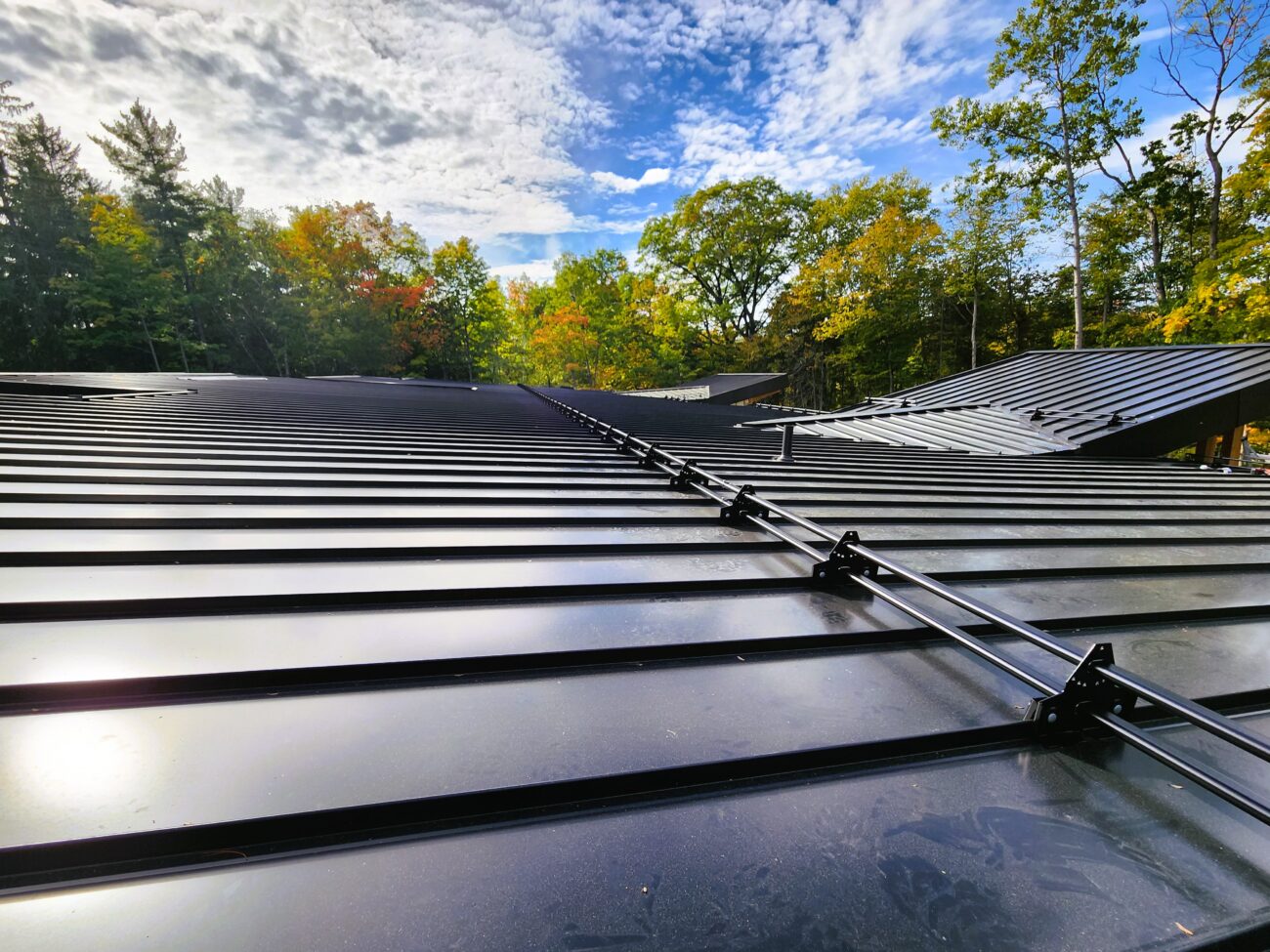 ORIMA LE2SL snow guard clamp detail on snap-lock standing seam roof, Muskoka Ontario