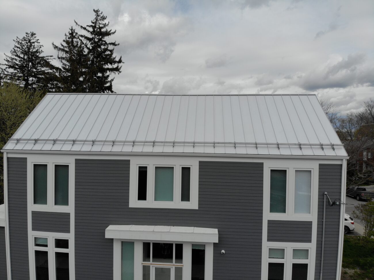 Mechanical lock standing seam metal roof in Galvalume on new residential build in North York, Toronto