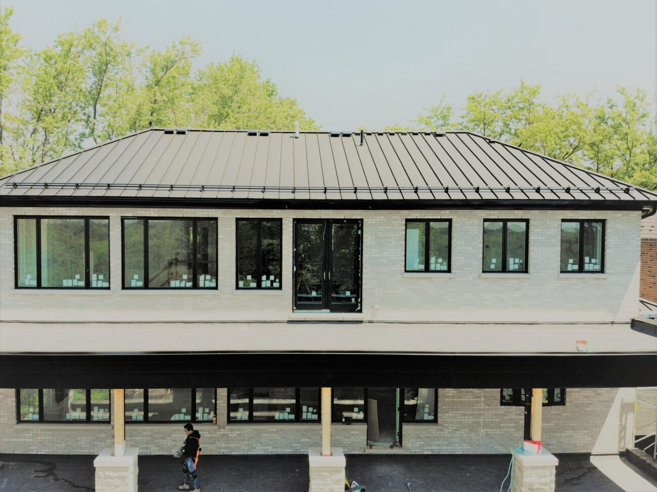 Black snap-lock standing seam roof full view, Scarborough Toronto