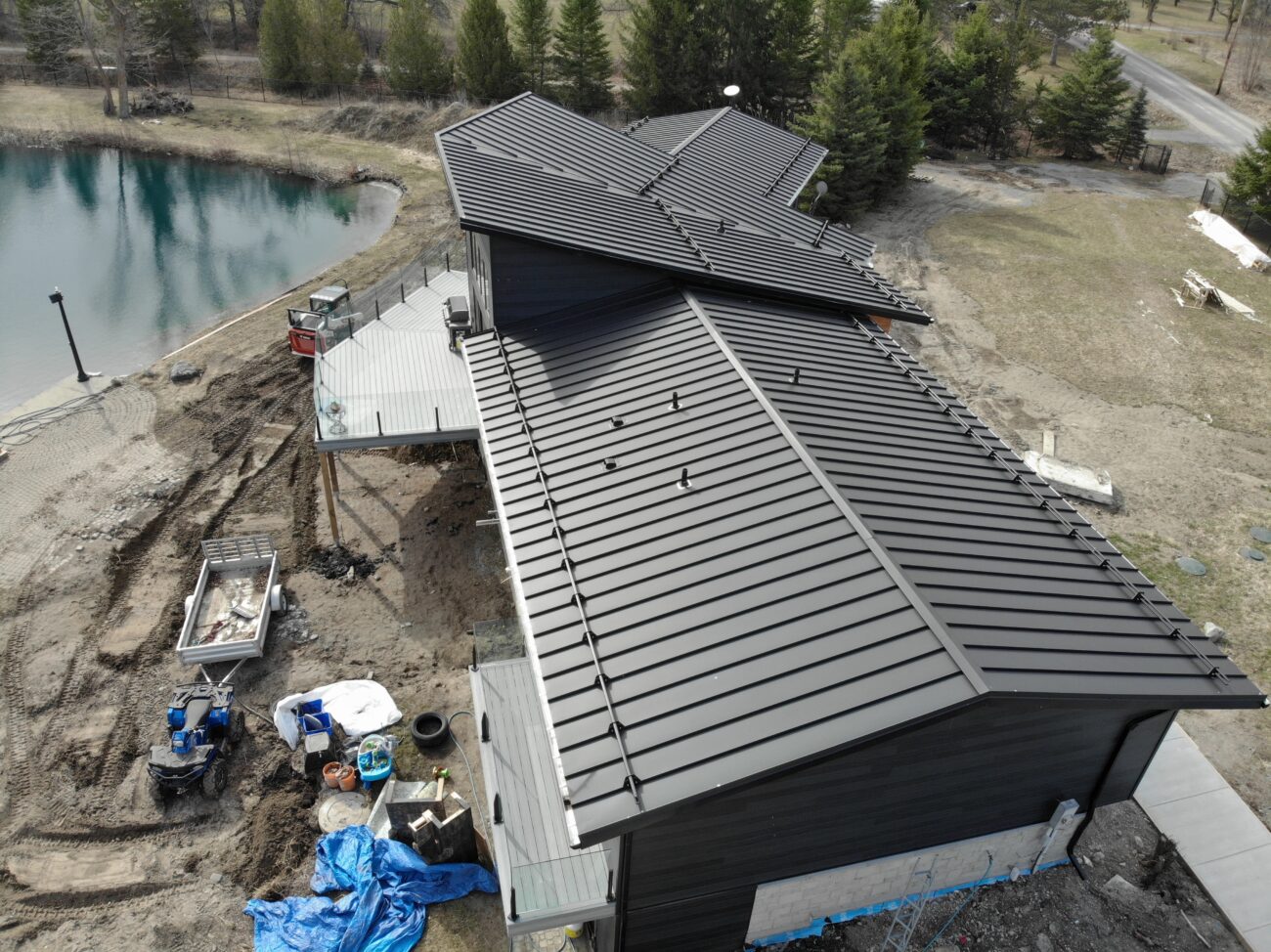 Black snap-lock standing seam roof full view, Uxbridge Ontario